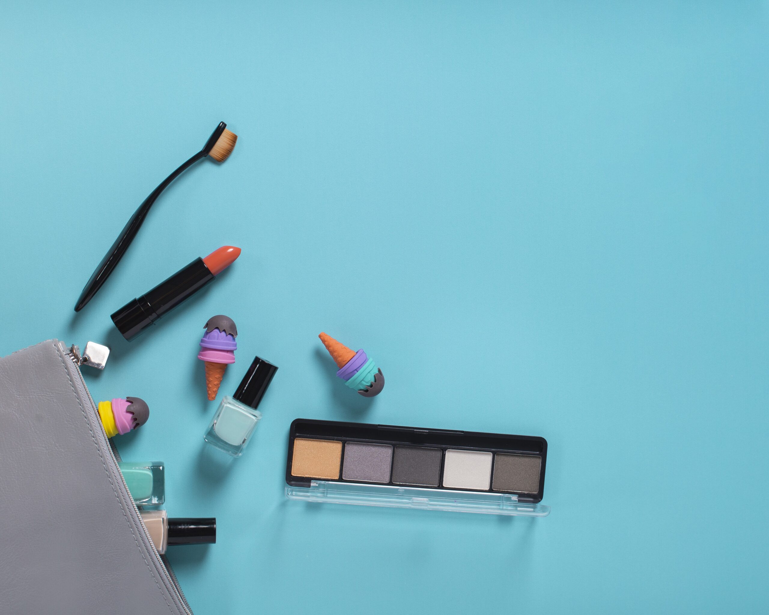 flat-lay-cosmetic-accessories-blue-background-with-copy-space (1)